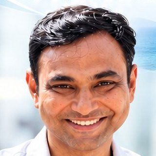 Dr. Mahesh Aghera